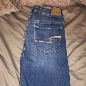 MEDIUM WASH NEXT LEVEL STRETCH AMERICAN EAGLE JEAN